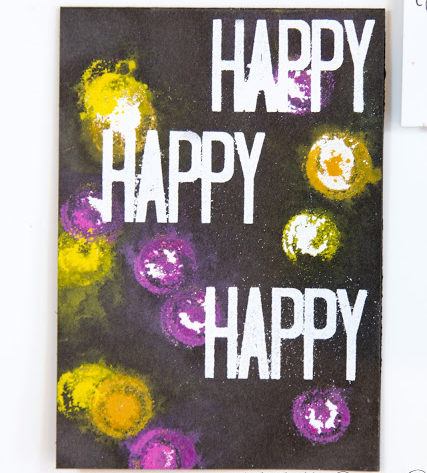 Happy Arty card featuring heat embossing and painted pattern by Taheerah Atchia