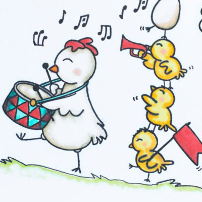 Close up of card featuring parade of chickens playing music